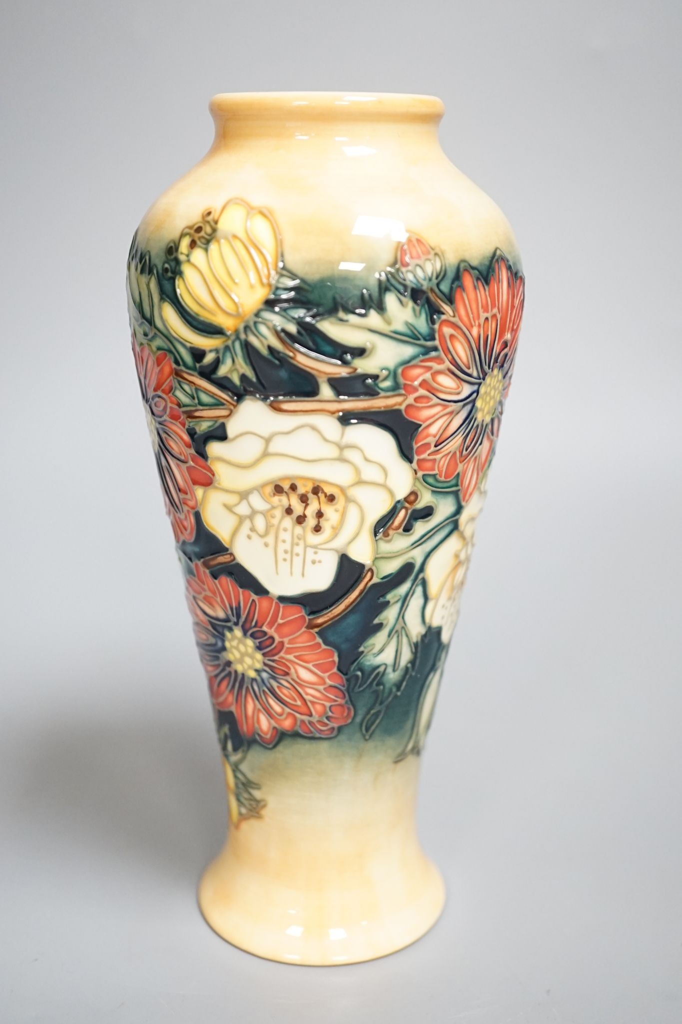 A Moorcroft vase, multi floral designed, signed E Bossons, 20.5 cms high.